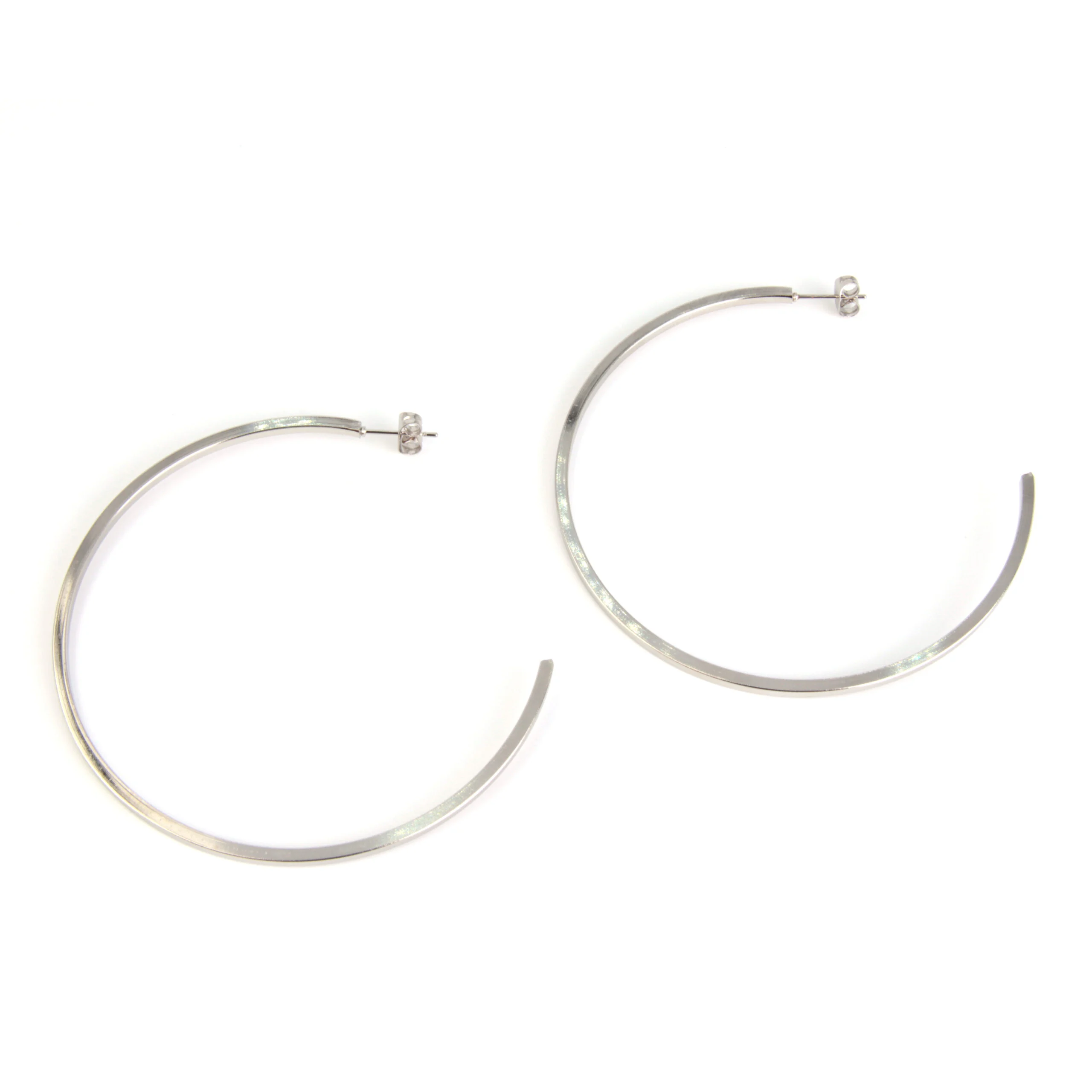 Aretes Acero Plateado tipo Medias Arracadas Planas