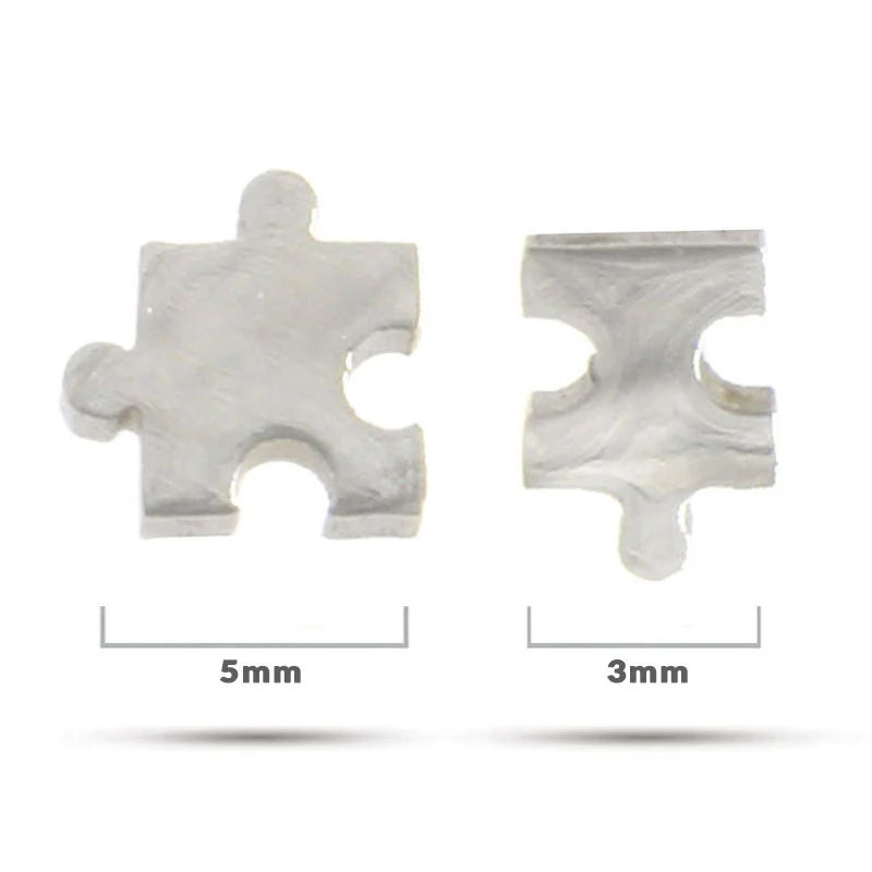 Aretes Tipo Broquel Acero Plateado Petite Rompecabezas