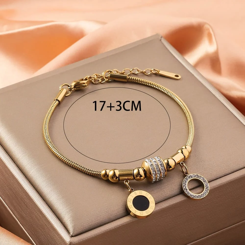 Pulsera Acero Dorado Cola de Rata Circulo Negro Resina