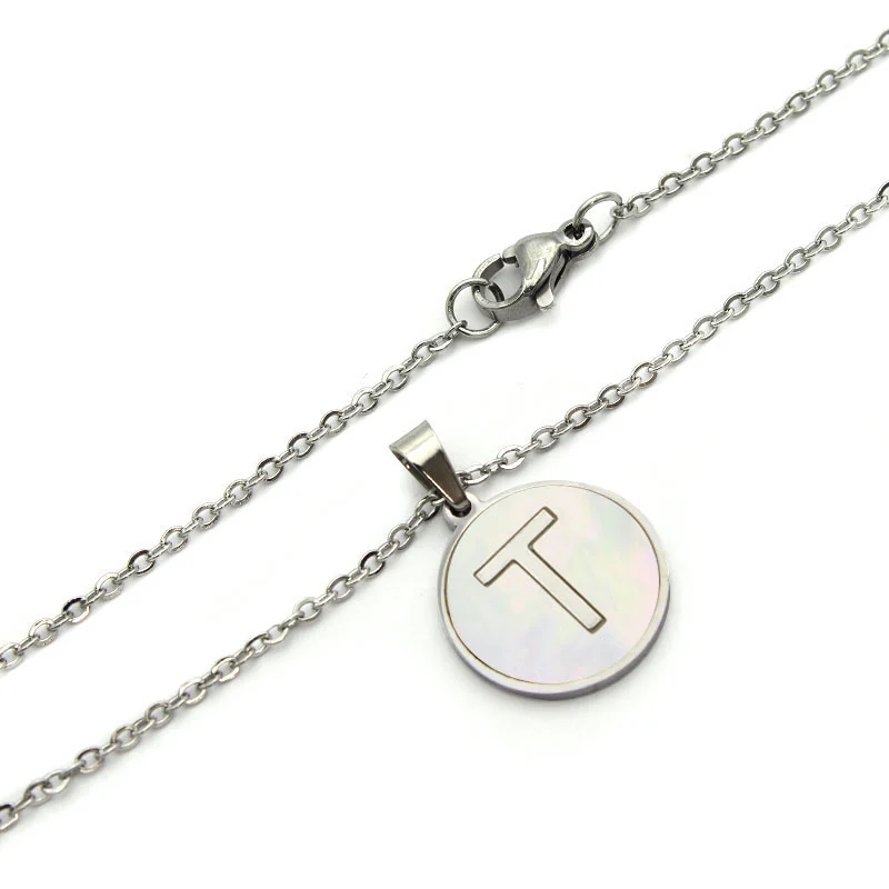 Collar Acero Plateado Circular Letra T Madre Perla